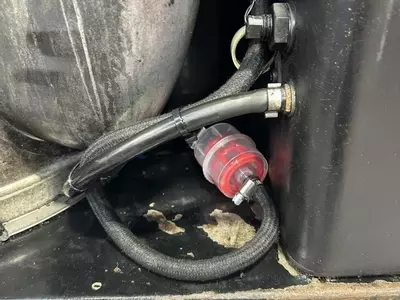 New diesel fuel filter fitted during industrial hot pressure washer repair and fuel system overhaul 